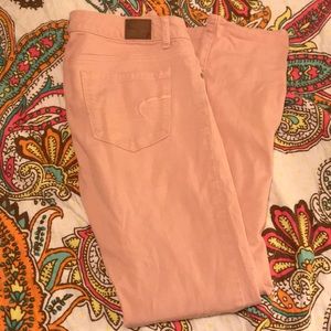 American Eagle light pink skinny jeans